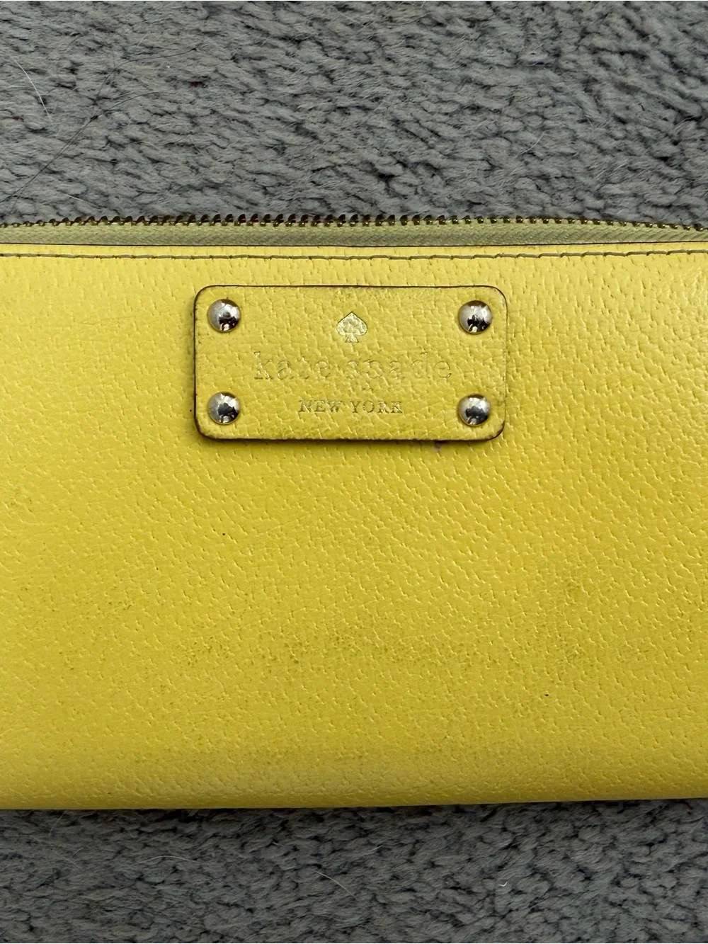 kate spade bright yellow zip-around wallet